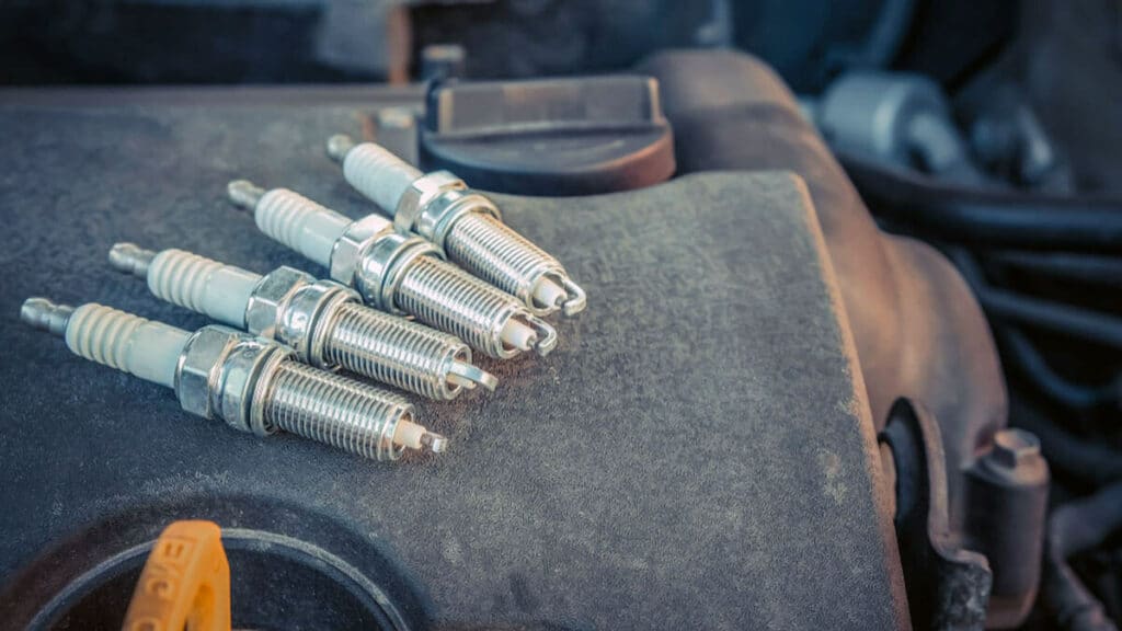cleaning alternator spark plugs with abrasives